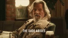 The Dude Abides While Holding Beer Bottle GIF