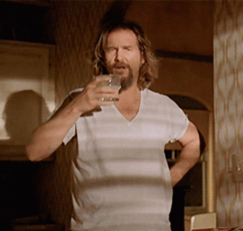 The Dude Spitting His Drink GIF