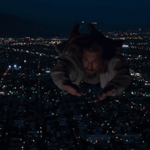 The Dude Flying Over The City GIF