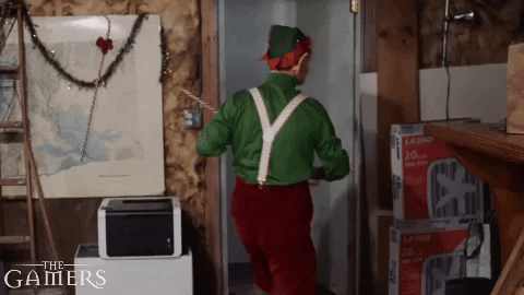 The Gamers Christmas Elf Candy Cane As Sword GIF