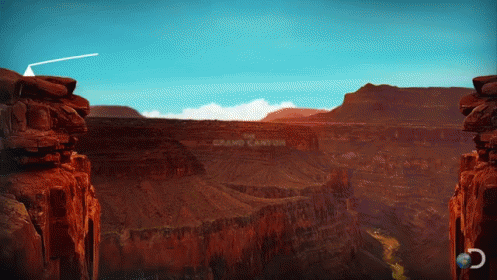 The Grand Canyon Is Written On The Side Of A Mountain GIF