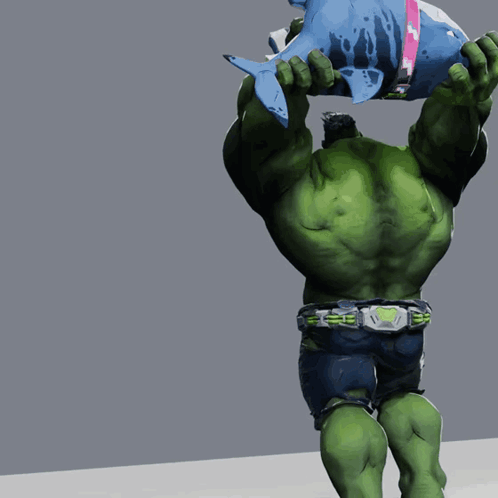 The Hulk Is Holding A Shark On His Head GIF
