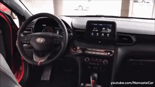The Inside Of A Red Car With A Youtube Link GIF