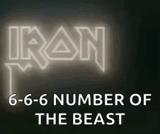 The Iron Maiden Logo Is Glowing In The Dark And Has A Number Of The Beast On It . GIF