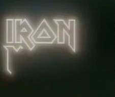 The Iron Maiden Logo Is Lit Up On A Black Background GIF