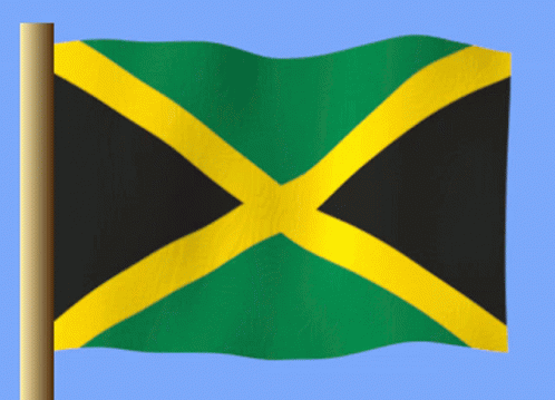 The Jamaican Flag Is Waving In The Wind Against A Blue Sky GIF