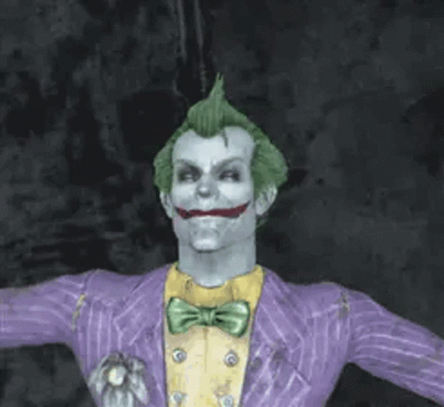 The Joker Is Wearing A Purple Jacket And A Yellow Shirt And Has A Mohawk . GIF