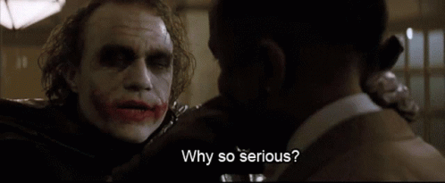 The Joker Says Why So Serious While Talking To A Man In A Suit GIF
