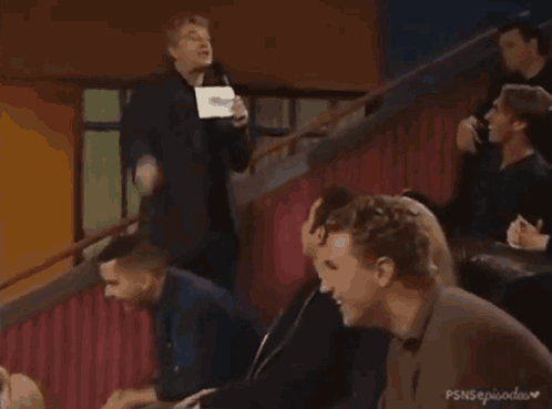 The Larry Winger Show Is Being Shown On A Television GIF