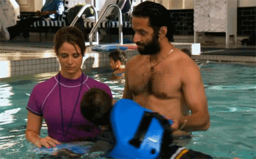 The League Dragging Kid From Swimming Pool GIF