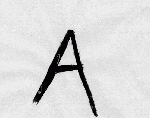 The Letter M Is Written In Black Ink On A White Surface GIF