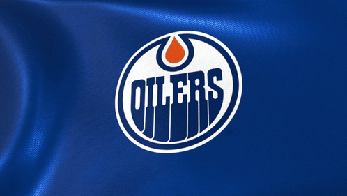 The Logo For The Oilers Is On A Blue Cloth GIF