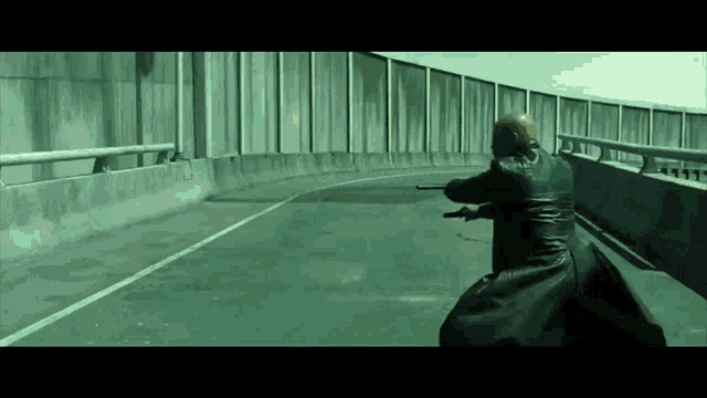 The Matrix Morpheus Firing GIF