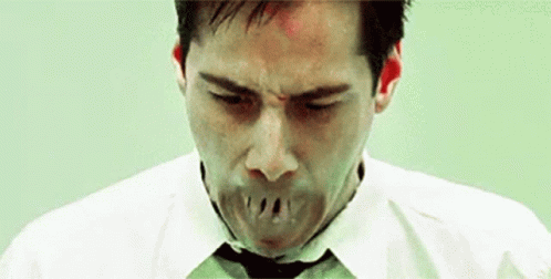 The Matrix Neo Mouth Shut GIF