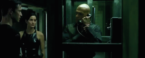 The Matrix Neo Vanishing From Phone Booth GIF