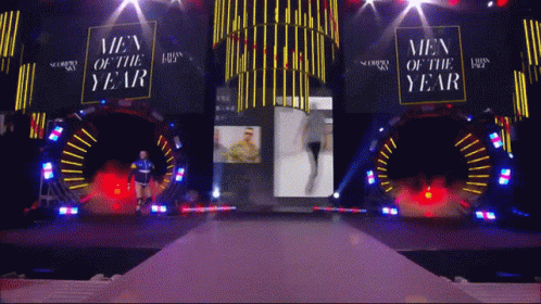 The Men Of The Year Awards Are Being Held On A Stage GIF
