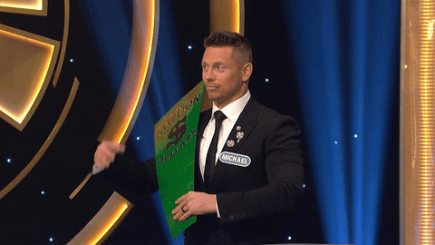 The Miz Hugging 1 Million Dollars Sign GIF