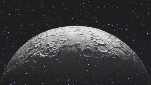 The Moon Is Surrounded By Stars In A Dark Space GIF