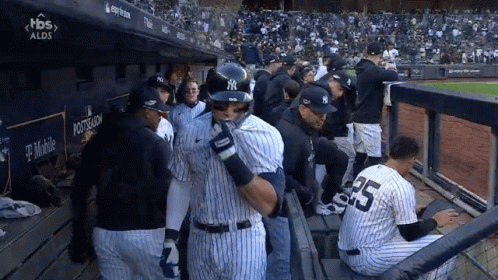 The Number 25 Is On The Back Of A Baseball Player GIF