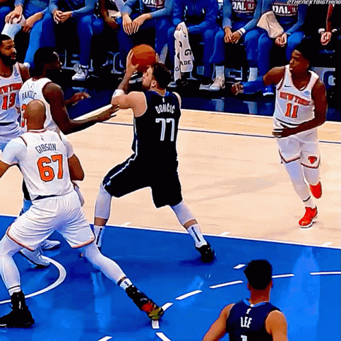 The Number 77 Is On The Back Of A Basketball Jersey GIF