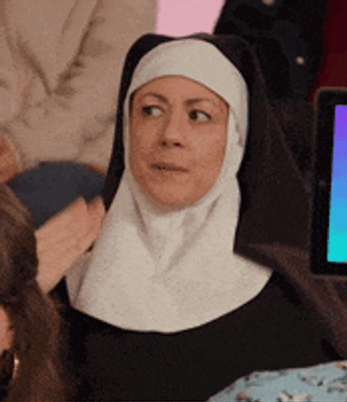 The Nun Fanning Her Hand Reaction GIF