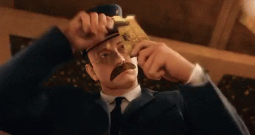 The Polar Express Conductor Punches Holes On Ticket GIF