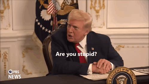 The President Of The United States Is Sitting At A Desk With A Pbs News Logo In The Corner GIF
