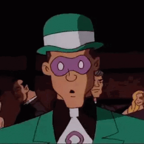 The Riddler From The Batman Animated Series Is Wearing A Green Hat And A Purple Mask . GIF