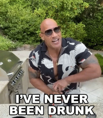 The Rock Is Wearing Sunglasses And A Shirt That Says `` I 'Ve Never Been Drunk '' GIF