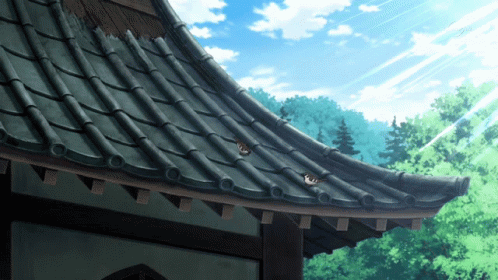 The Roof Of A Building With A Blue Sky In The Background GIF