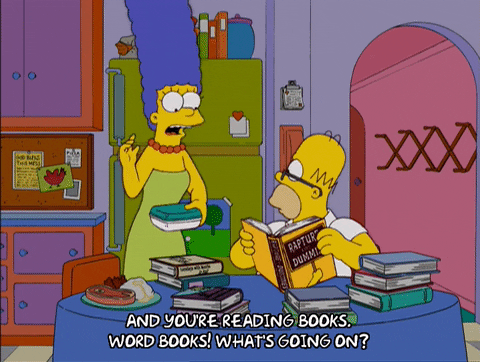 The Simpson Argues Reading Book GIF