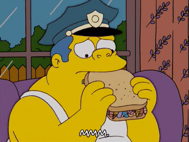 The Simpson Cop Eating Idiot Sandwich GIF