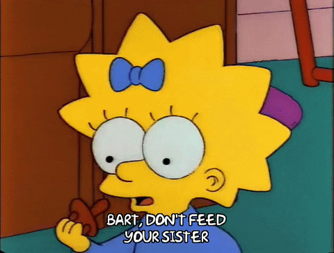 The Simpsons Maggie Holding Monopoly Money GIF