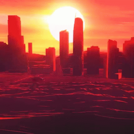 The Sun Is Setting Over A City With A Lot Of Buildings GIF