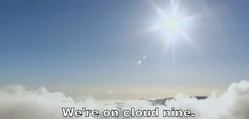 The Sun Is Shining Through The Clouds And The Words We 'Re On Cloud Nine Are Visible GIF