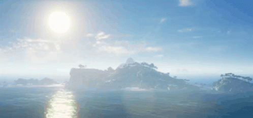 The Sun Shines Brightly Over The Ocean With A Small Island In The Distance GIF