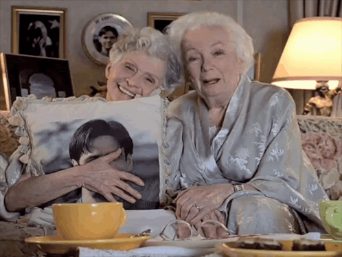 The Truman Show Avid Fans Hugging GIF