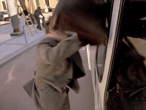 The Truman Show Truman Burbank Chasing Bus GIF