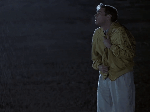 The Truman Show Truman Burbank Running Rain GIF