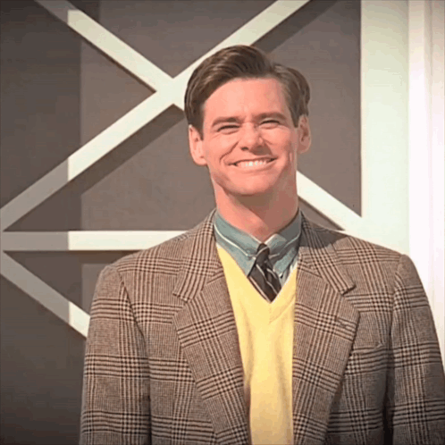 The Truman Show Truman Burbank Smiling Whle Pointing GIF