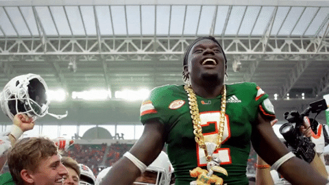 The U Trajan Bandy Raising Hands GIF