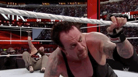 The Undertaker Looking Around GIF