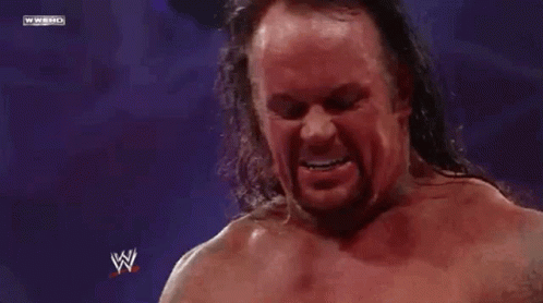The Undertaker Saying Stay Down GIF