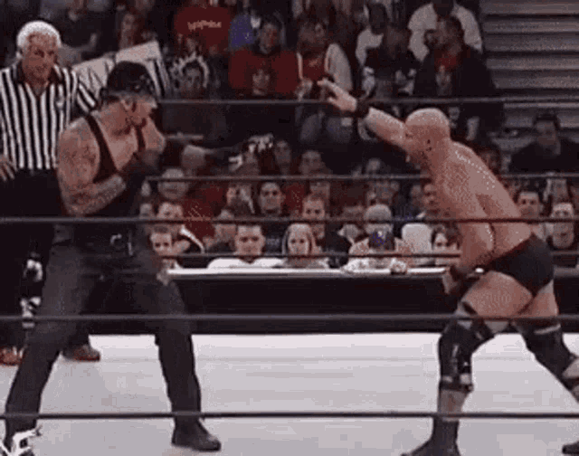 The Undertaker Slowly Raising His Hand GIF