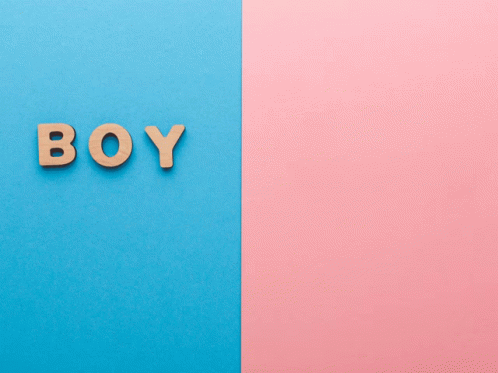 The Word Boy Is Made Of Wooden Letters On A Blue And Pink Background GIF
