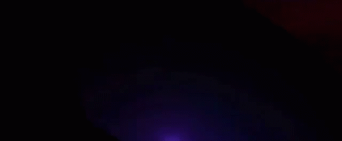 The Word Goosebumps Is Glowing Brightly In The Dark GIF