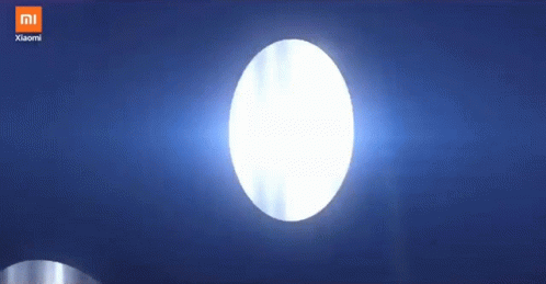 The Word Redmi Is Displayed On A Dark Blue Background GIF