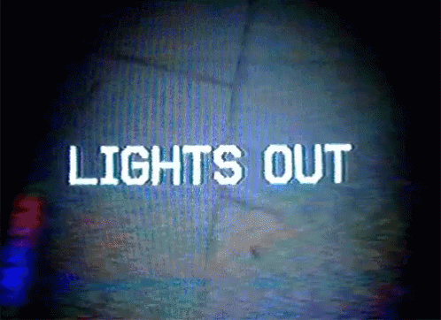 the words lights out are displayed on a dark screen