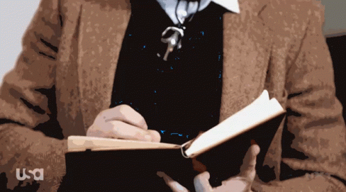 Therapist Kyle O Reilly Jotting Down Notes GIF