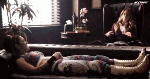 Therapist Talking To Patient Lying On A Sofa GIF
